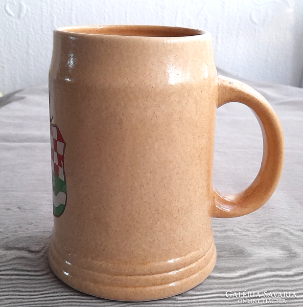 Ceramic jug with coat of arms