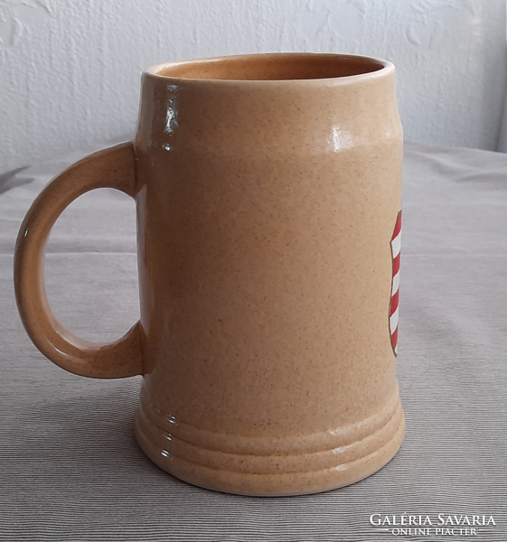 Ceramic jug with coat of arms