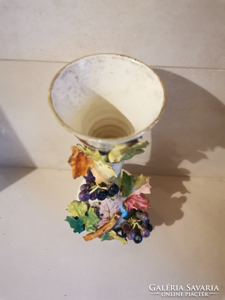 Antique ceramic vase with plastic decorations