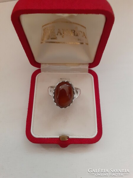 Marked silver ring set with an amber colored stone