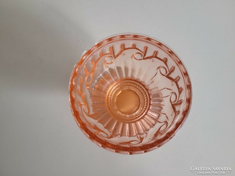 Old glass goblet with pink base