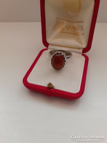 Marked silver ring set with an amber colored stone