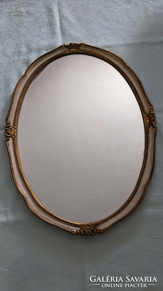 Venetian oval mirror with original frame.