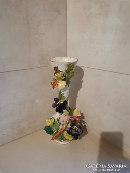 Antique ceramic vase with plastic decorations