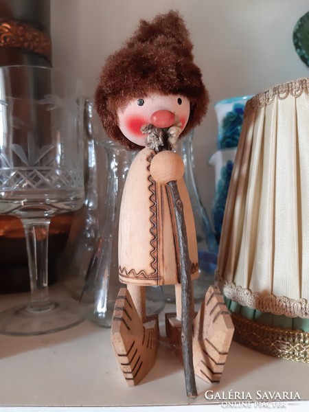Retro Transylvanian shepherd with a tuft of fur on ski boots wooden figure souvenir toy