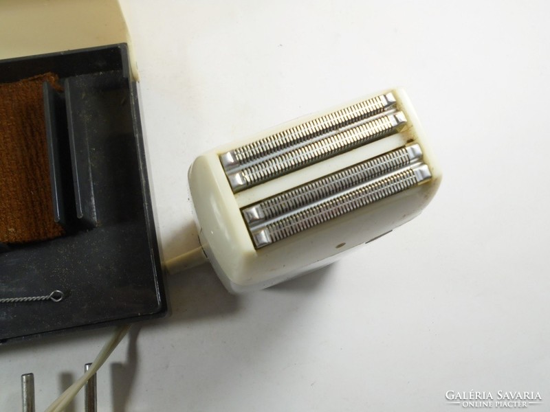 Retro old electric shaver in its original case, Soviet-Russian production, works