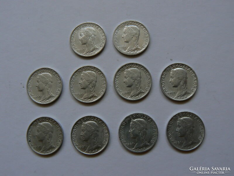 A collection of 10 5-penny coins from 1961