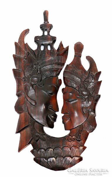 Oriental carved scene, made of mahogany wood