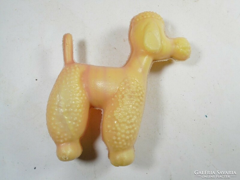 Retro toy plastic poodle dog peddler from the 1970s