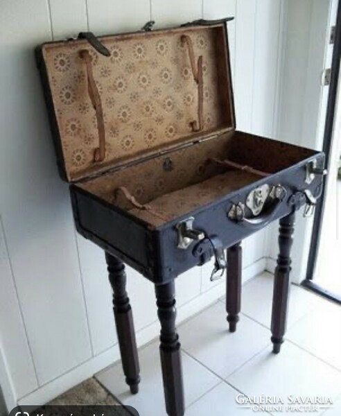 Old suitcase with retro checkerboard pattern in German big wooden frame suitcase