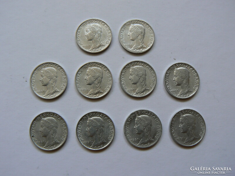 A collection of 10 5-penny coins from 1961