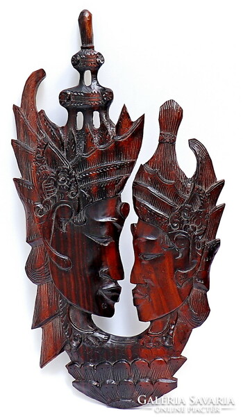 Oriental carved scene, made of mahogany wood