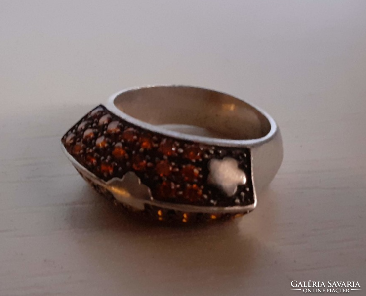 Nice condition hallmarked 925 silver ring set with sparkling tiny orange cubic zirconia stones