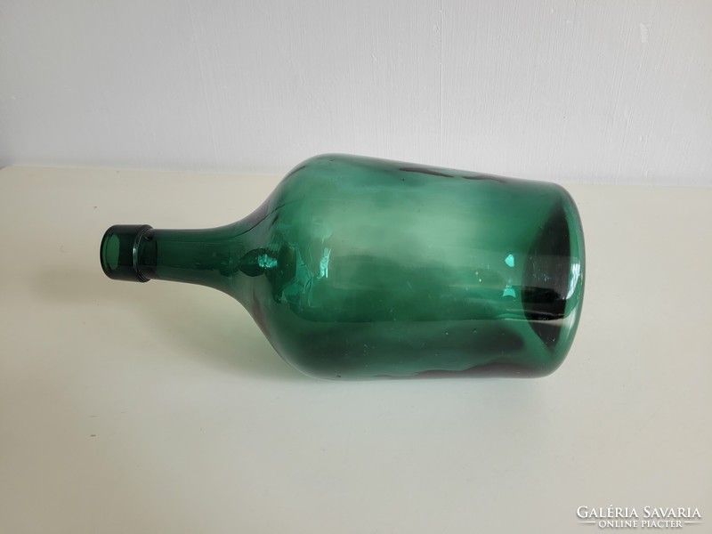 Old green dark green lenticular glass vintage wine bottle glass bottle decoration