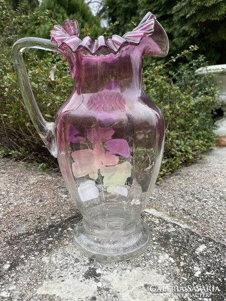 Antique jug with beautiful curled edges