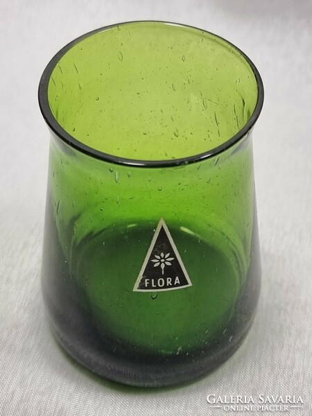 Zöld üvegváza " Flora " feliratos címkével, XX.szd második fele.