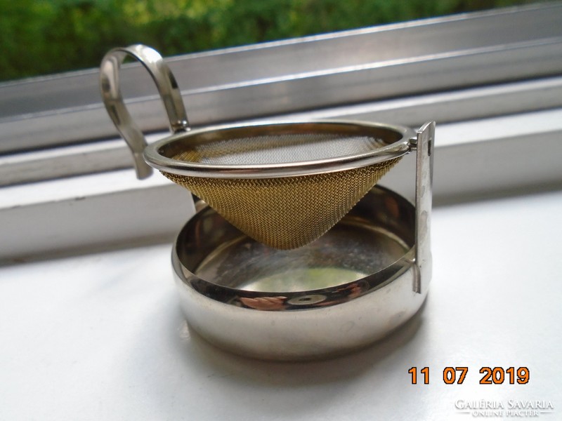 Antique silver-plated tea infuser with metal mesh filter