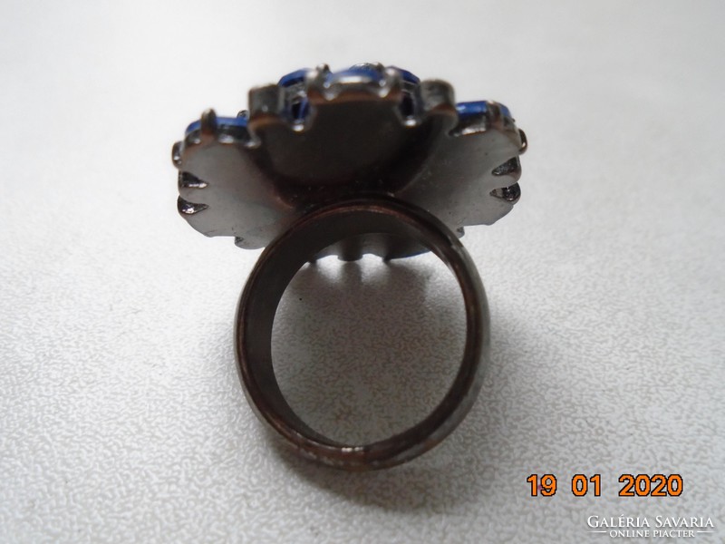 Spectacular, large, decorative ring with many royal blue faceted stones
