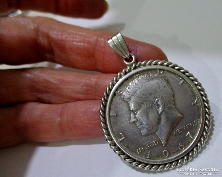 A special silver dollar pendant