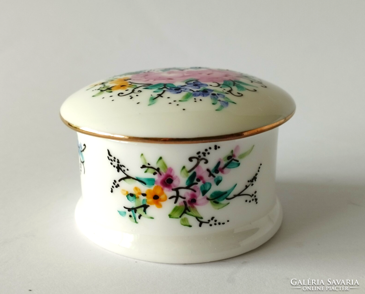 Beautiful small hand-painted porcelain jar with cushions