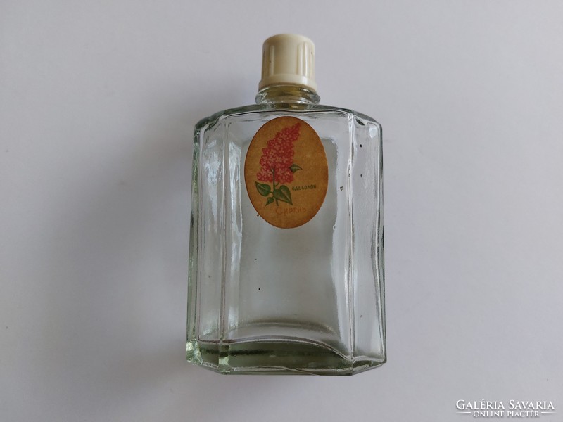 Retro russian cologne bottle with old labeled perfume bottle