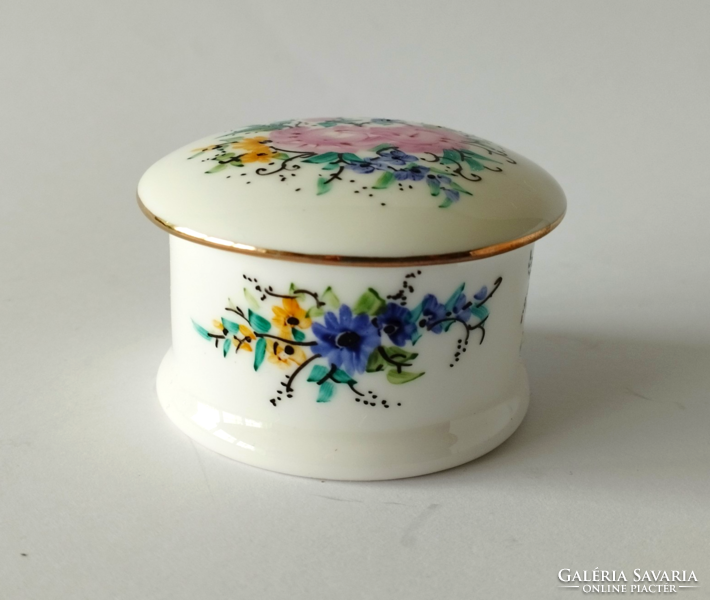 Beautiful small hand-painted porcelain jar with cushions