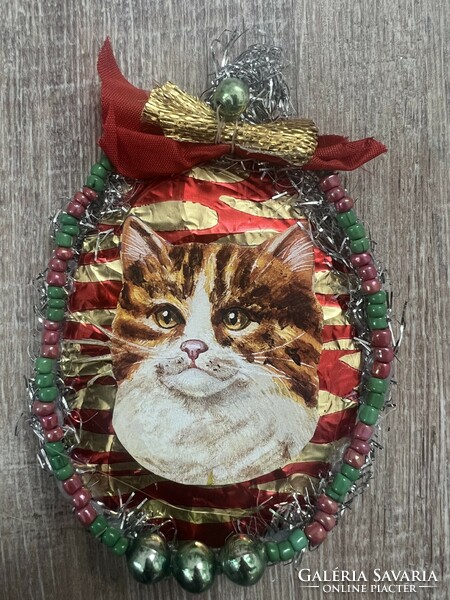 Christmas tree decoration with cats from old and new papers