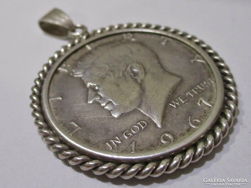 A special silver dollar pendant