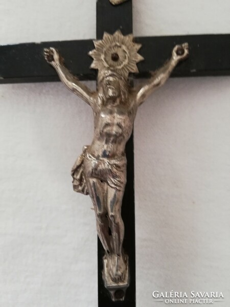 Antique wooden cross with metal body, for home altar