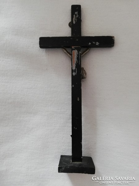 Antique wooden cross with metal body, for home altar