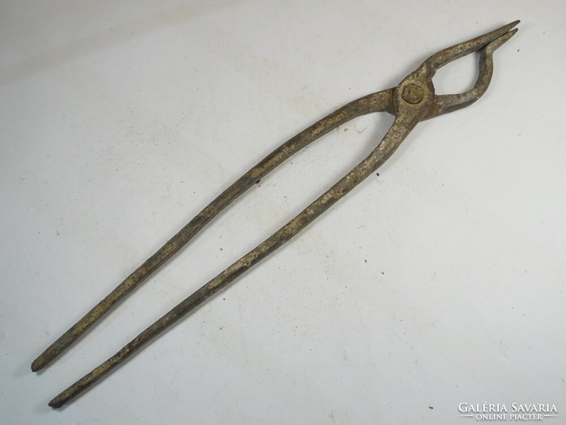 Large wrought iron pliers, blacksmith workshop tool