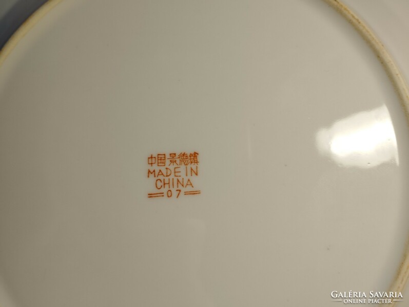 Old Chinese large flat porcelain plate with a dragon