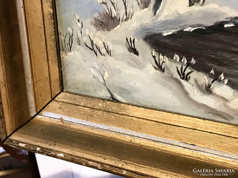 Oil-on-wood painting of a winter landscape with a house in an old wooden frame