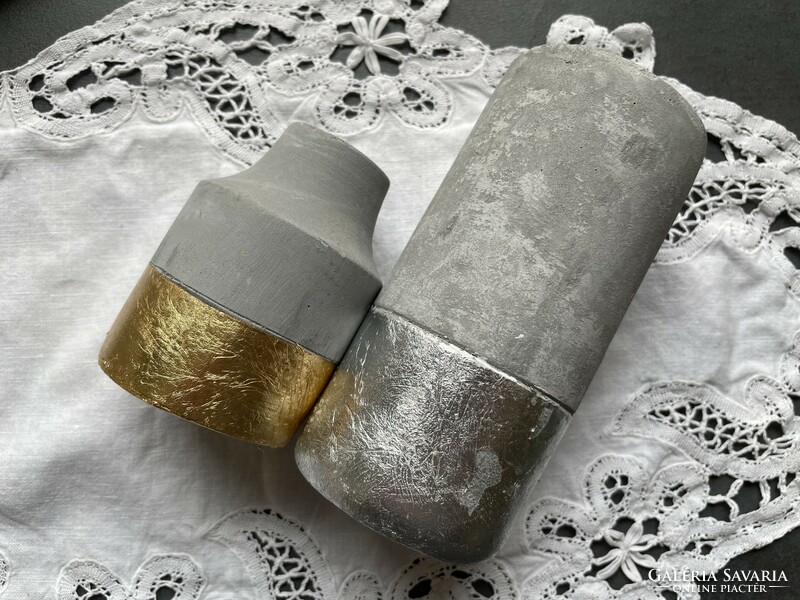Pair of modern gold and silver smoke decorated concrete candle holders