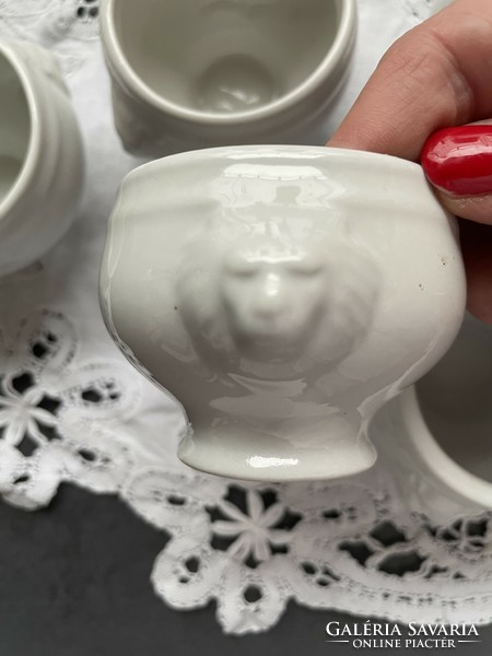 Egg holder with lion's head base included