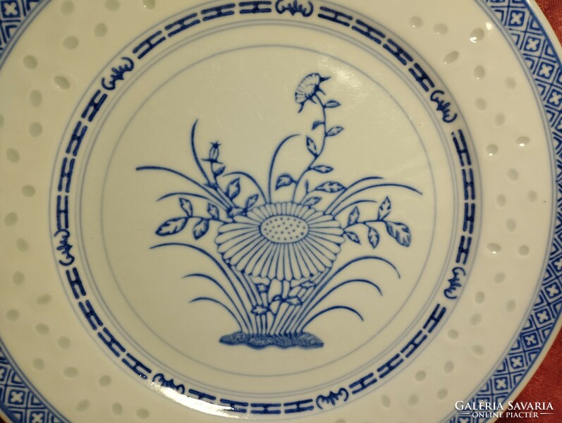Large flat Chinese porcelain plate with grains of rice