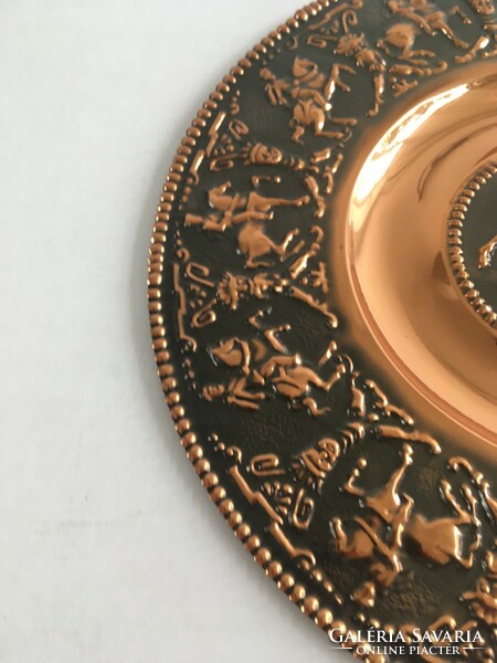 Old, vintage, retro richly decorated, equestrian, hussar scene copper decorative plate, wall plate