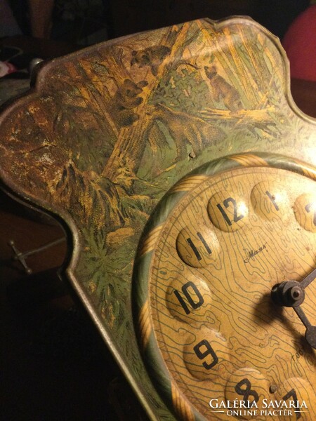 Old Russian wall clock bears in the pine forest