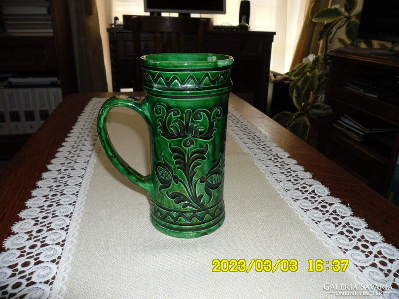 A beautiful Korund glazed pitcher with a handle