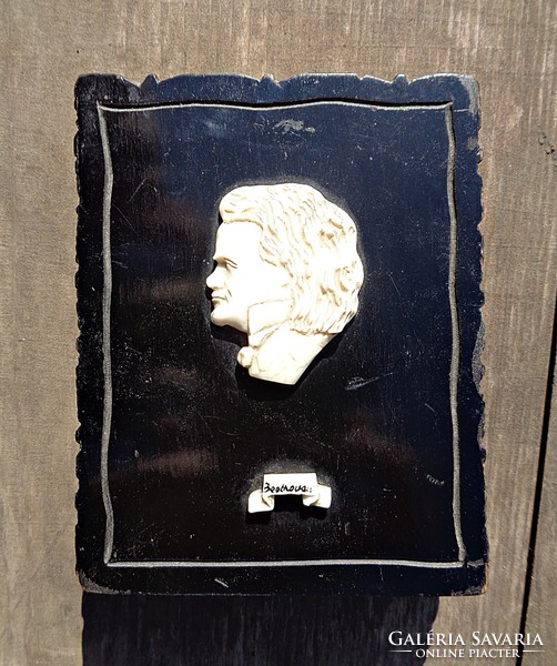 Carved profile picture of Beethoven, wooden base, ornamental object