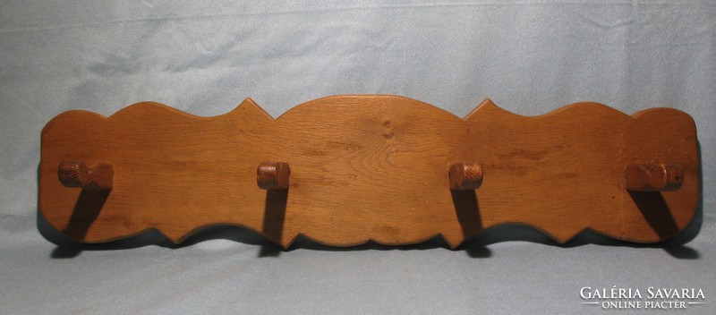 Old beautiful wooden hanger with hanger