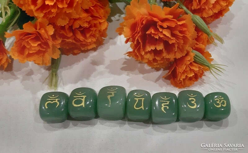 Sanskrit chakra symbols real term. Engraved in aventurine in styly, topaaa