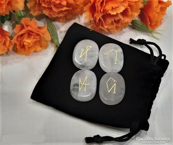 The sigils of the four archangels are engraved in white quartz in an elegant setting, topaaa