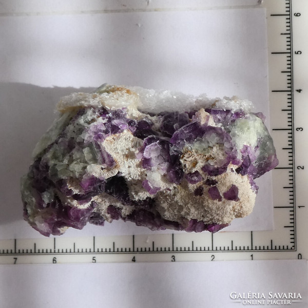 Purple-green fluorite crystal group grown in a quartz layer. 84 grams.