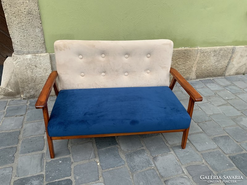 Refurbished, reupholstered retro sofa