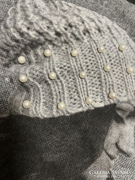 Knitted gray Italian hoodie with a cap for a woman's head
