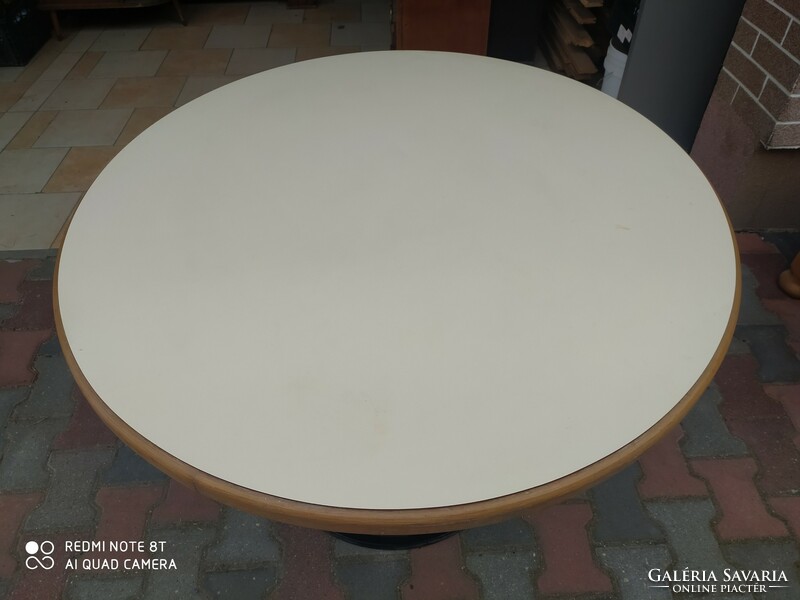 Large round table with cast iron base