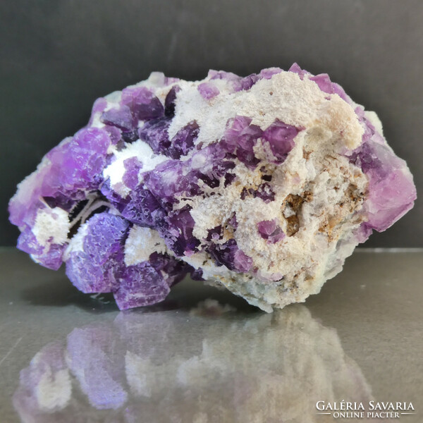 Purple-green fluorite crystal group grown in a quartz layer. 84 grams.