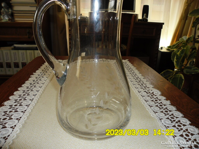 Antique polished glass jug