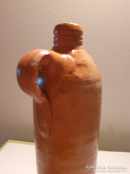 Old tile bottle with folk eared ceramic beverage bottle vintage